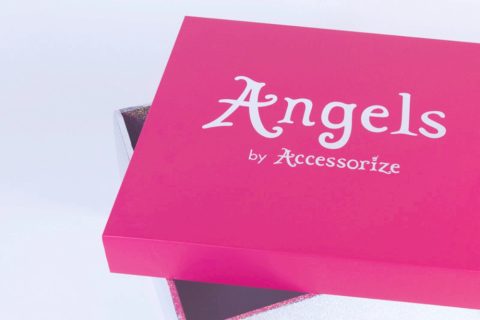 A custom bespoke pink product sleeve made for the brand Monsoon by PW Shop. Also shown is the product box for Angels by Accesorize.