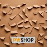 A cardboard backdrop with random shapes protruding from it. PW Shop logo is also shown.